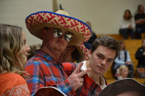Seniors Mitch Mullen and Dalton McKeel show off their fiesta-themed gear in honor of senior night during the boys varsity basketball game at home against Castle View High School, Wednesday, Feb. 14.  