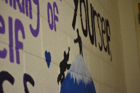 The mural on the wall of the girls bathroom outside the 3000s pod stands as a reminder of the importance of considering the emotions of all students.  
