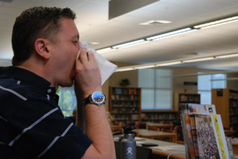 Mr. Winkleman blowing his nose during seventh period in the library.