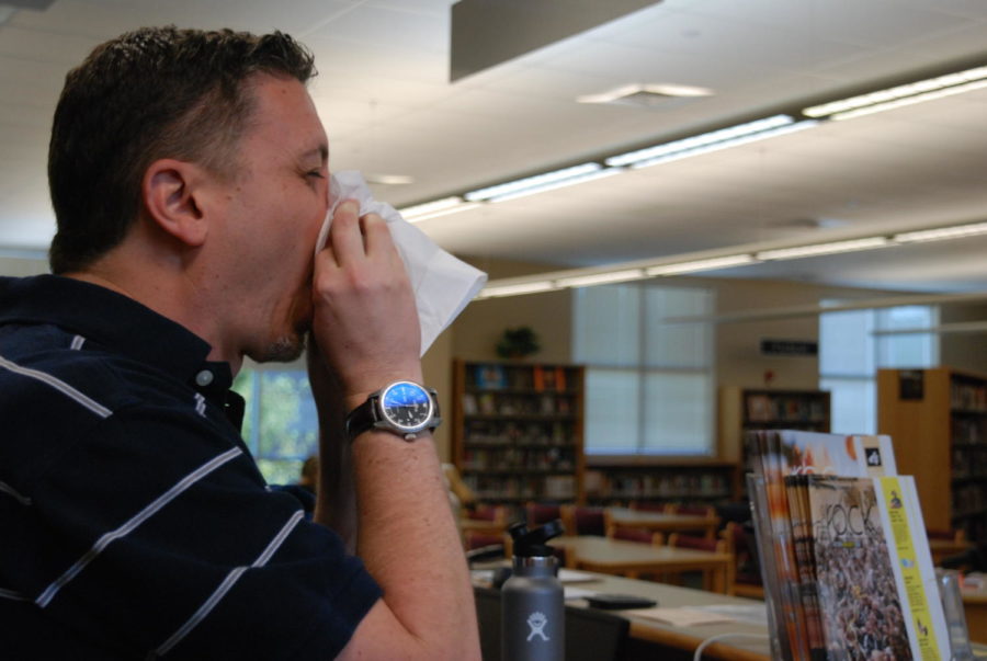 Mr.+Winkleman+blowing+his+nose+during+seventh+period+in+the+library.