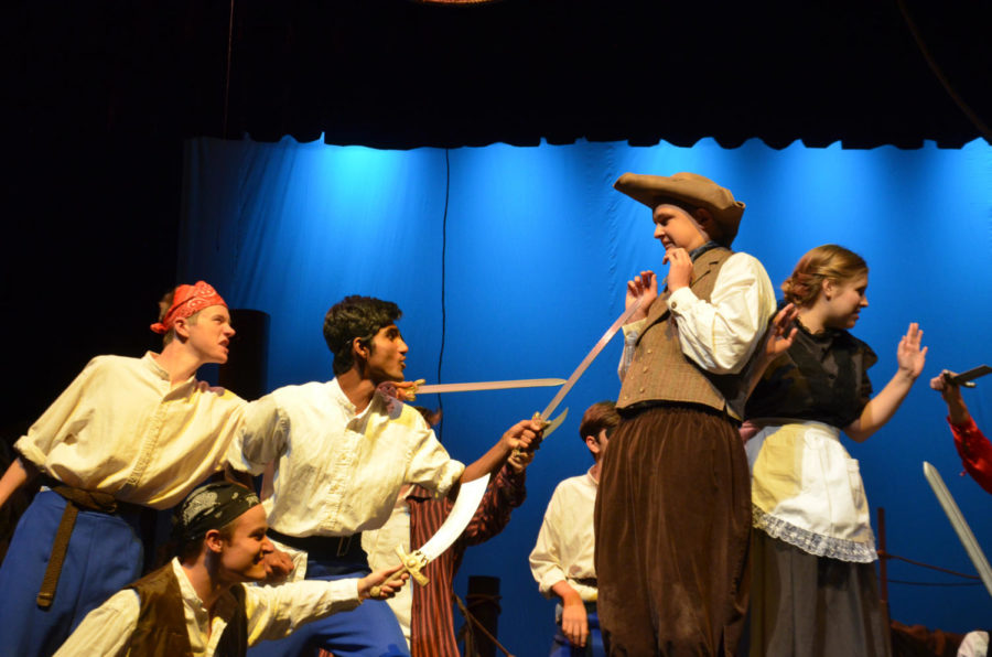 Andrew Dupper 22 (Pirate) and Aditya Vepa 20 hold their swords up to Colin Johnson 21 (Alf) during the final dress rehearsal for their show. The show runs Thur. (9/26) through Sat. (9/28) at 7 p.m.