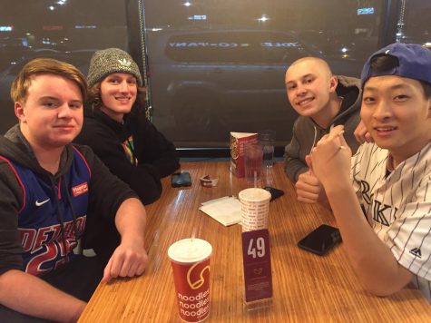 Nathan Engler 21, Jack Keough 21, Aidan Chung 21 and Brett Birtzer 21 pose for a photo while waiting for their food at Noodles & Company Feb. 27. Engler, Keough, Chung and Birtzer have been to all the Dish for a Wish restaurant starting from Fridays Jersey Mikes to Thursdays Noodles & Company. We love supporting Wish Week and Fabians wish despite the long lines, Keough said.
