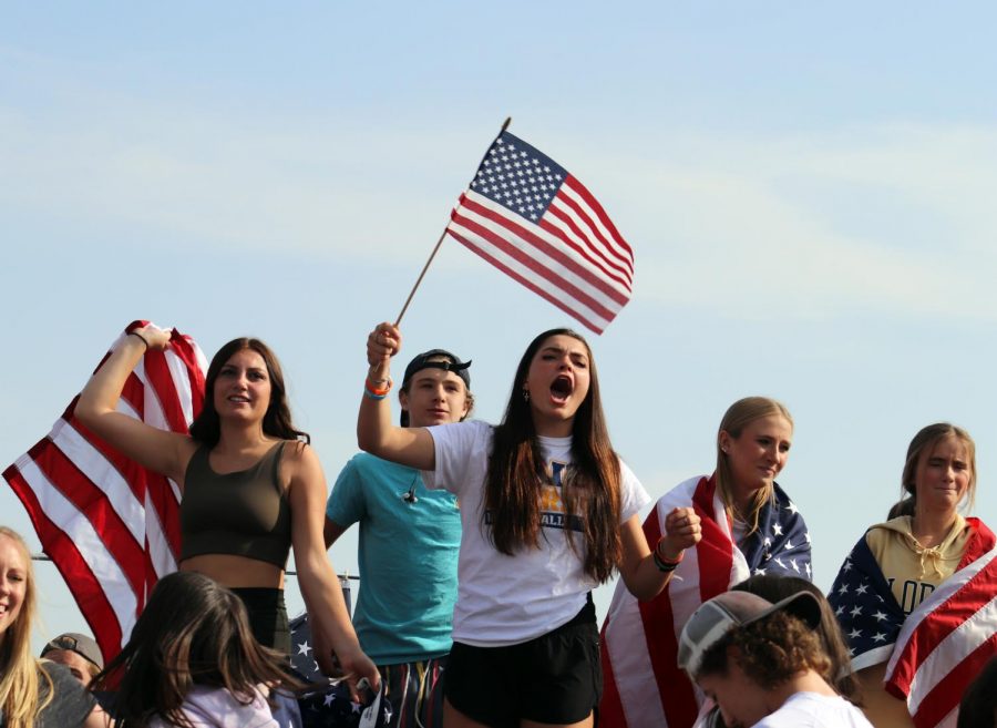 Kennedy+Karbowski+%E2%80%9824+chants+in+opposition+to+the+mask+mandate+at+the+anti-mask+walkout+in+the+student+parking+lot+Sept+1.+Karbowski+and+other+students+protested+the+Tri-County+Health+Department%E2%80%99s+decision+that+requires+students+to+wear+a+mask+in+school+in+a+walkout+organized+by+the+%40dcsd_anti_masks+Instagram+account.%0A