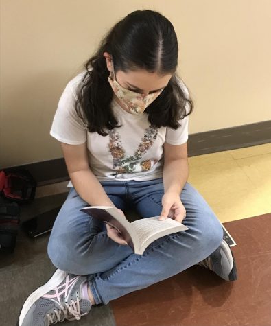 Sophia Miller 25 reads Percy Jackson and the Olympians before school  on Oct. 7.