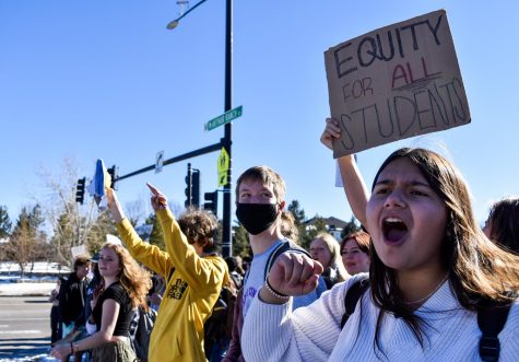 Students cheer at honking cars driving by the protest Feb. 7. After walking laps around the campus, protesters gathered at the intersection of McArthur Ranch Road and Monarch Boulevard for the remainder of the walkout.