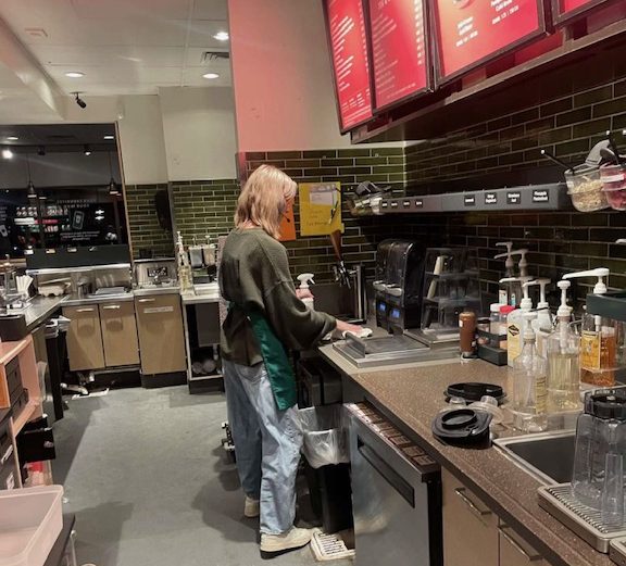 Izzy Bartos ‘23 closes up Starbucks as she heads home after a 5-hour shift Nov. 12. It was a cold and busy night as baristas were overwhelmed with new holiday orders, cranky customers, and technical difficulties behind the counter. “My shift was extremely tiring, seeing as its the beginning of our holiday season and customers are going crazy over holiday drinks. We ran out of three types of milks today so it was definitely a disaster,” Bartos said.