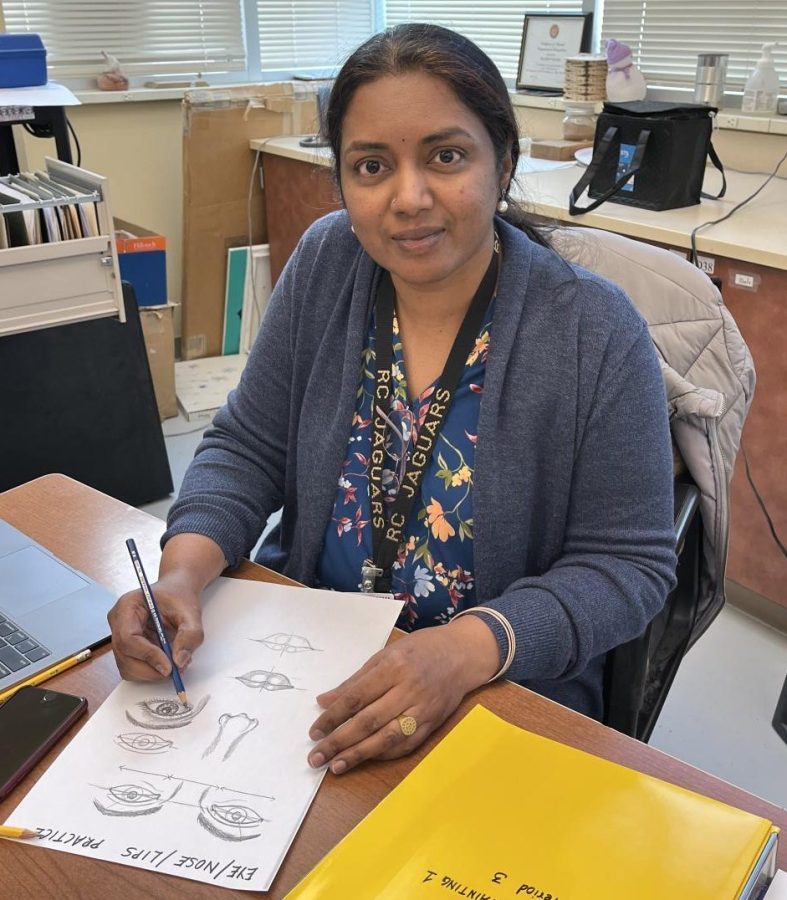 Prema Viswanathan works on examples to show her Drawing and Painting students. Viswanathan took over the previous teacher’s, Drew Walter, classes. "I try to study their techniques and then get inspired by them to create my own artwork,” Viswanathan said.