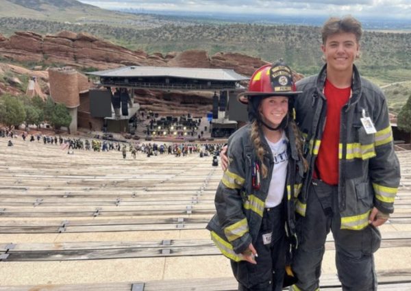 Isabelle Piche 24 and Collin Naibauer 24 smile at the top of Red Rocks Amphitheatre after completing the Red Rocks 9/11 Memorial Stair Climb Sept. 11. The two students and their Fire Science peers joined hundreds of citizens in doing nine laps around the amphitheatre to complete a distance similar to the 110 floors first responders climbed up the World Trade Center on the day of the attacks. Others should definitely consider doing the climb because it’s a very eye-opening experience with the amount of adults, children, firefighters, paramedics, police and other people [who] come together to honor something so tragic, Piche said.