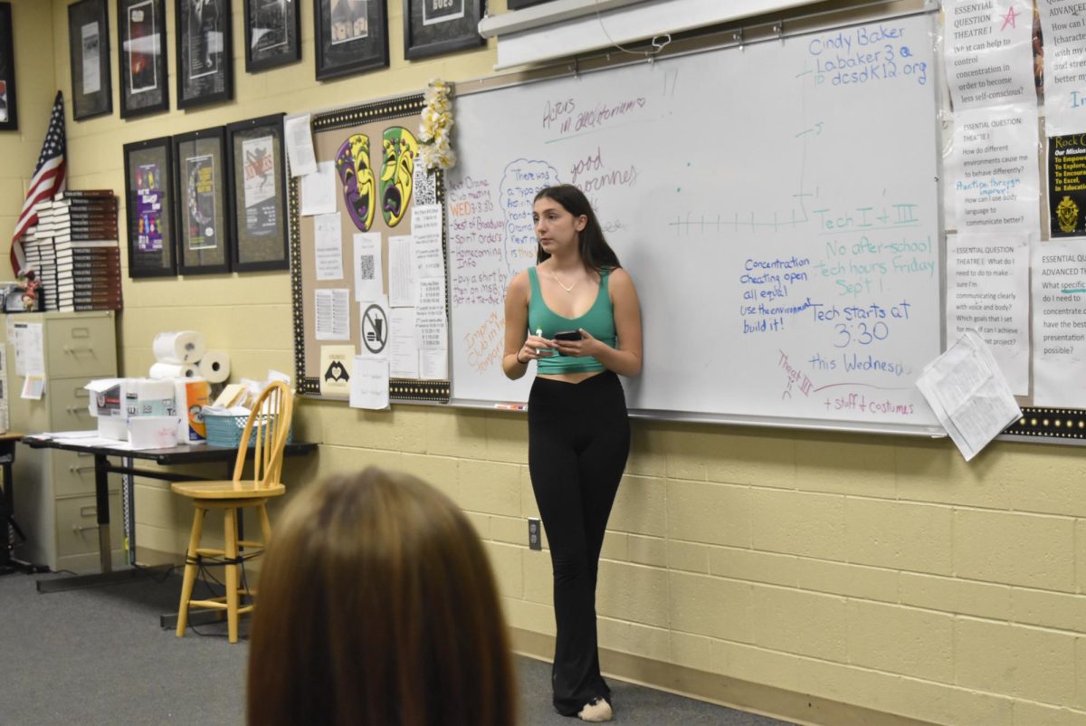 Cate Walls ‘26 walks her One Act group through an exercise to figure out where they need energy in their performance Aug. 28. The One Acts kicked off the year for Drama Club Sept. 8. “I would love to direct a One Act, I actually plan on directing in the spring,” Walls said. “I have directed before, with Oliver Conrad, and [I found] I love directing because it’s a whole different perspective. I love that aspect because I love being able to build something up and see it all come together beautifully.”