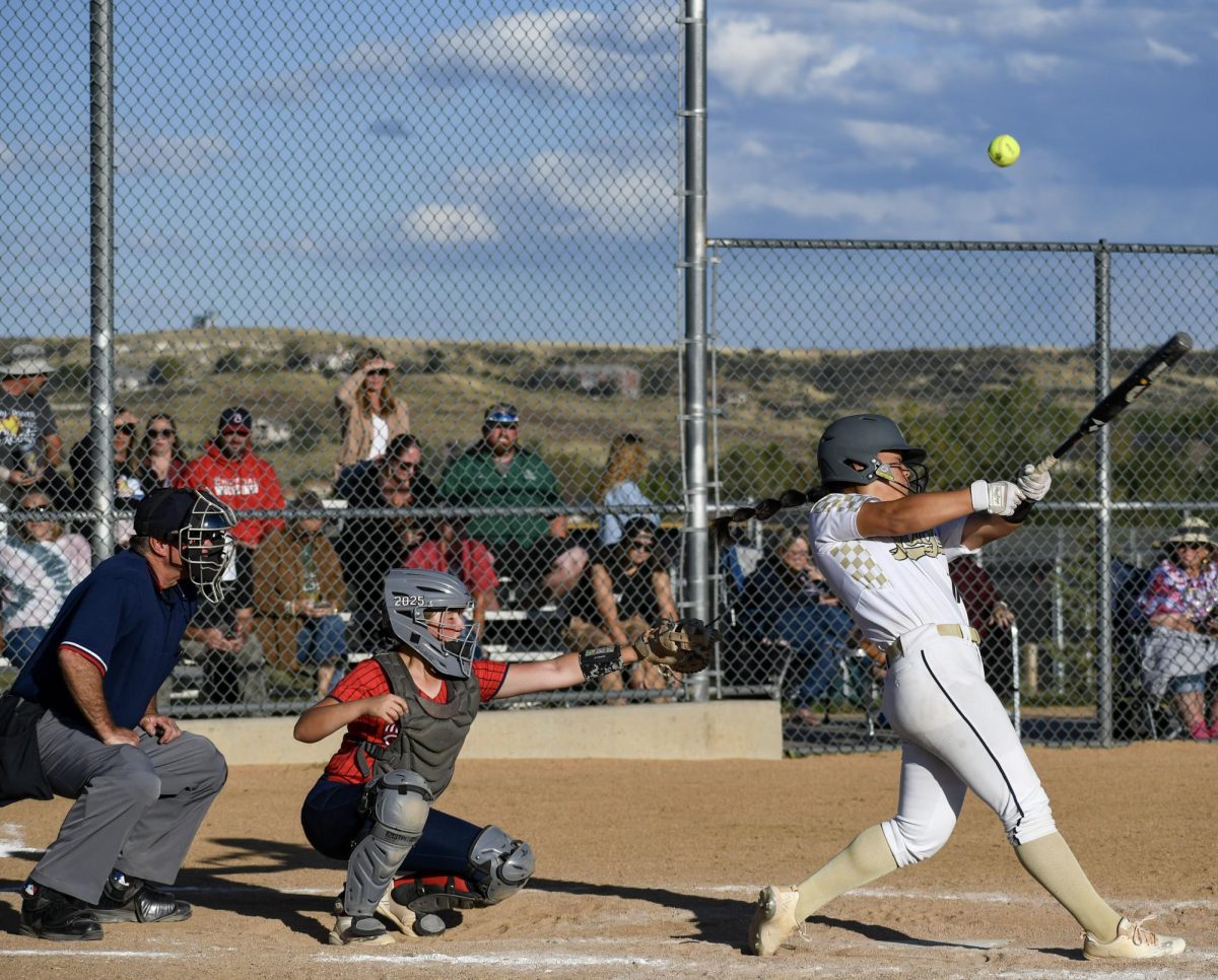 Varsity softball captain and shortstop Sydney Boulaphinh ‘24 swings to hit the ball during the fifth inning Oct. 3. Boulaphinh committed to play Division 1 collegiate softball for Stanford University during her junior year. This season was one of the worst seasons in Rock Canyon history, Boulaphinh said. I think this team had a lot of expectations and relied on many people to carry, and that never happened. I believe most of the games we lost, we could’ve won. It’s the little things that matter--when it came down to who got to 21 outs first, we weren’t the team.