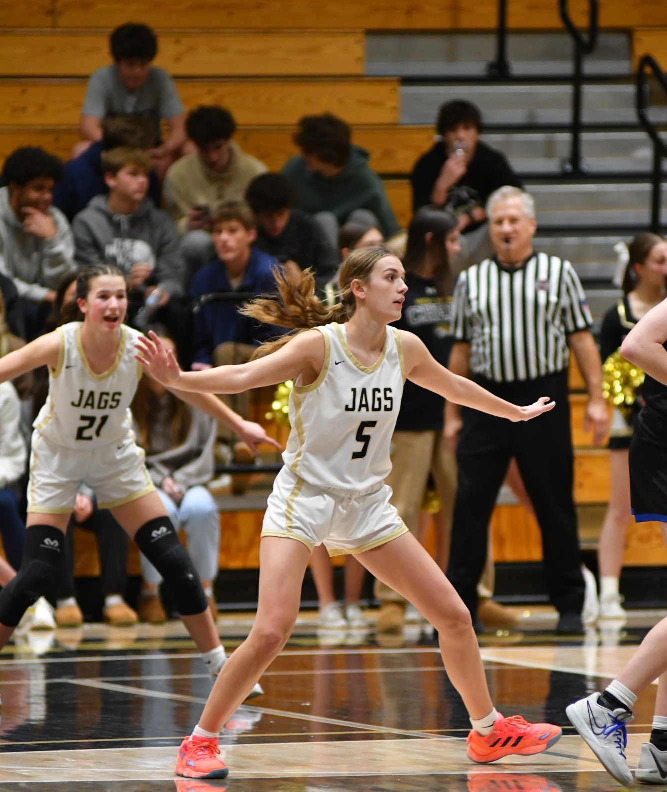 Forward Kate Fehr ‘24 and guard Alyssa Goode ‘25 play defense against the Falcons during the fourth quarter Jan. 11. Goode scored 10 points during this game and averages 10.3 points per game, according to MaxPreps. 