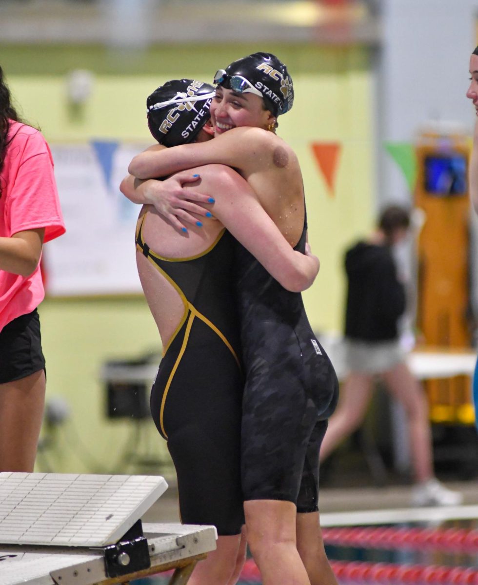 Senior varsity swimmer Kassidy Harris hugs Teagan Wetzel ’27 after the 400-yard freestyle relay, where she placed 12th overall at the Colorado High School Activities Association (CHSAA) 5A girls swim State Finals Feb. 9. State was held at Veterans Memorial Aquatic Center (VMAC) Feb. 8 for Preliminaries and Finals Feb. 9. The team took 10 state qualifiers to the meet and placed 14th overall out of 31 schools. The 200-yard medley relay placed 11th overall, along with the 200-yard freestyle placing 11th overall as well. “It was such a memorable experience to be at state with my team,” Harris said. “Everyone did so well and it was a great way to end the season!”