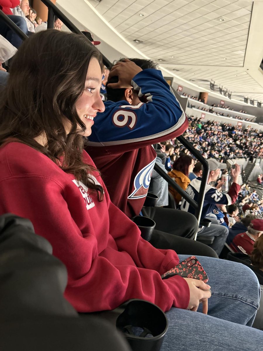 At Ball Arena, French National Honor Society (FNHS) members Amelia Solano ‘25 and Maanav Bhatt ‘24 watch the Colorado Avalanche game against the Montreal Canadiens at French Night With the Avs March 26. Chaperoned by French teacher Alexis Savas and science teacher Brandon Hommel, 15 French students attended the annual event from 5:30 p.m. to 9 p.m. and participated in hockey trivia, buying food and drinks from the vendors, meeting Avs mascot Bernie the St. Bernard and watching the game. The Avs lost 2-1. “This was my first Avs game and I loved that it was with my French class because I was with people I loved. We all took the Light Rail up to Ball Arena and then we did a Kahoot! that was testing us on Canadian French hockey which was interesting and then we watched the game! It was a really fun and energetic atmosphere,” Solano said. “I was very surprised by the turnout, especially on a Tuesday night, but everyone was very exciting even though we were losing.”