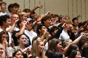 The junior class boos freshman during the opening assembly on the morning of Aug. 23. Booing has been a long-standing tradition during assemblies, but talks of shifting it to cheering have recently circulated the school. "[Freshmen are] expecting to come in with everyone supporting them and us booing them makes them upset and sad," Daksha Gopalakrishnan ‘25 said. "I think it has a negative effect on them, they won’t be able to feel welcome or anything like that."