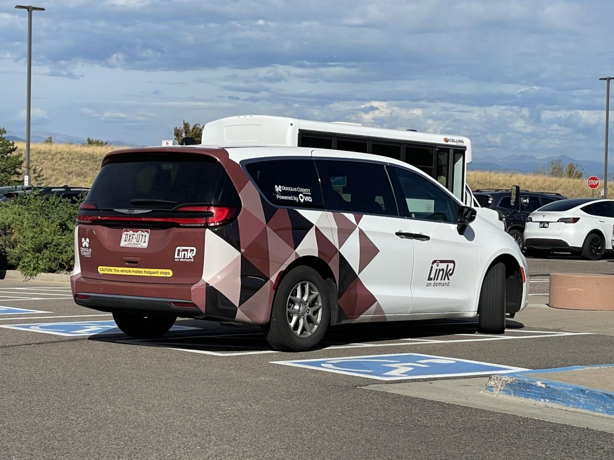 A Douglas County Link Vehicle waits in the parking lot, offering residents flexible on demand transportation.